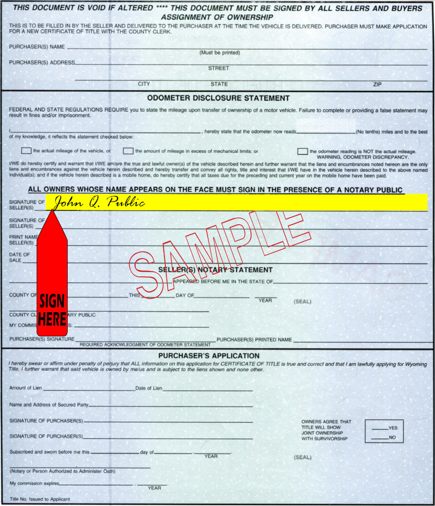 Title transfer instructions for Wyoming — highlighted area shows where to sign